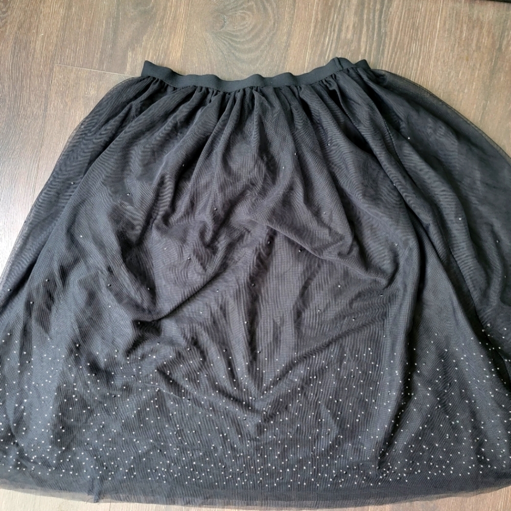 Black tulle circle skirt with rhinestones at the bottom